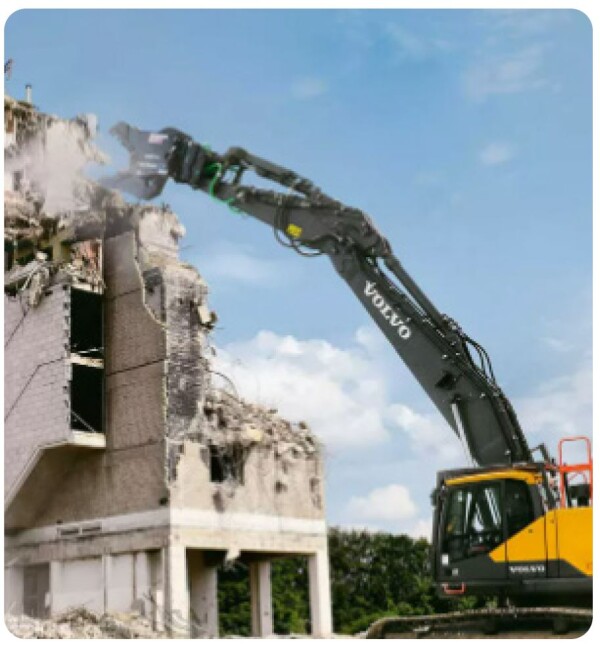 A muncher at work demolishing a building